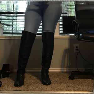 Long black riding boots